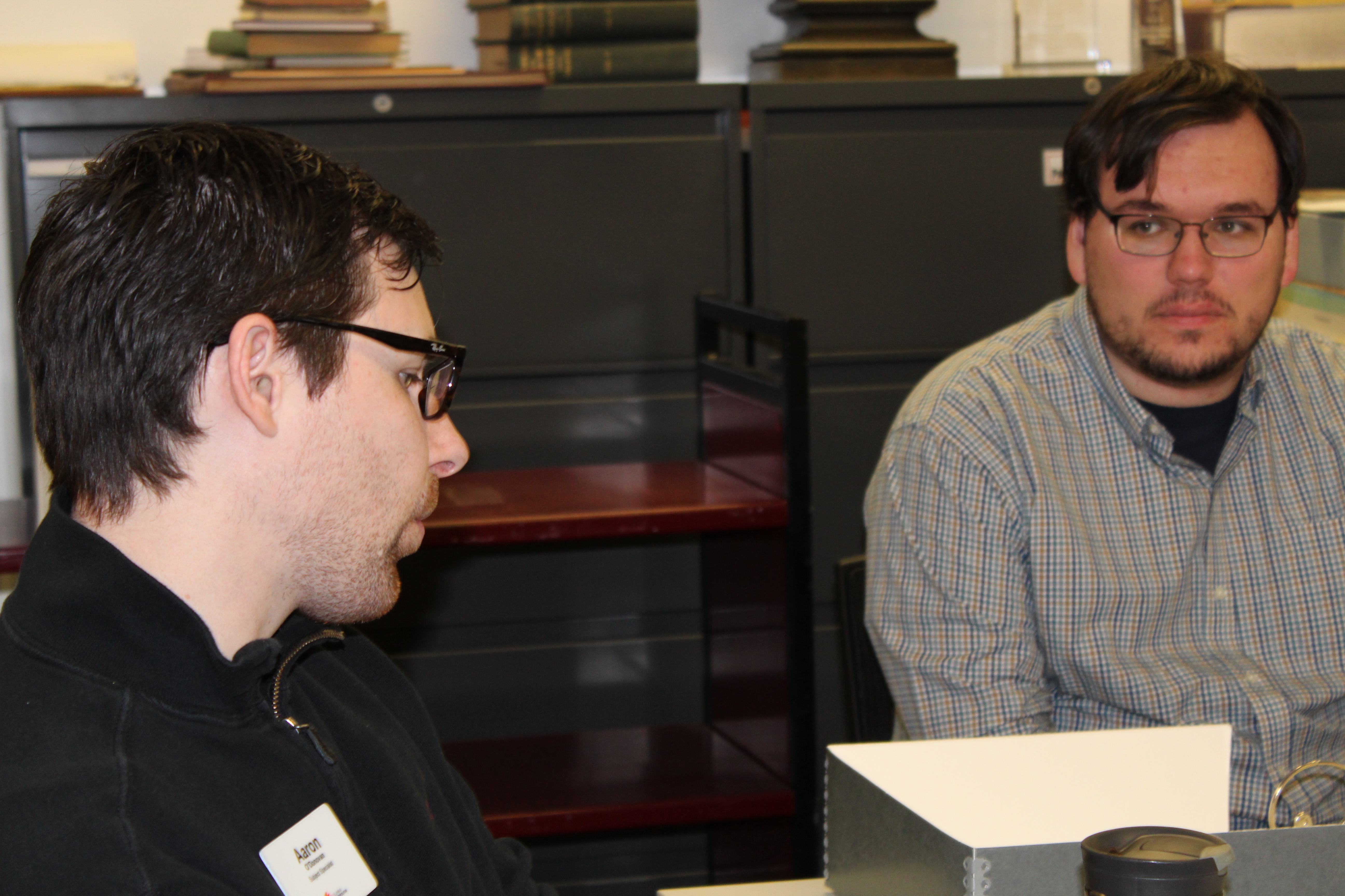 (L to R) Librarian Chuck Cody and Daniel Maharg discuss the internship project.