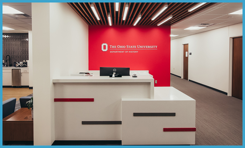 Front desk with department of history sign behind it