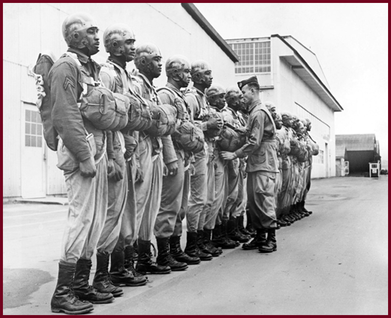 A drill instructor during an inspection of paratroopers at Fort Benning in Chattahoochee County, Georgia, 24th February 1944. Some of the paratroopers are named (but not identified) as Corporal Elijah H. Wesby, Sergeant Robert S. Walden, Sergeant Jack D. Tillis, and Sergeant Daniel Weil. (Keystone/Hulton Archive/Getty Images)