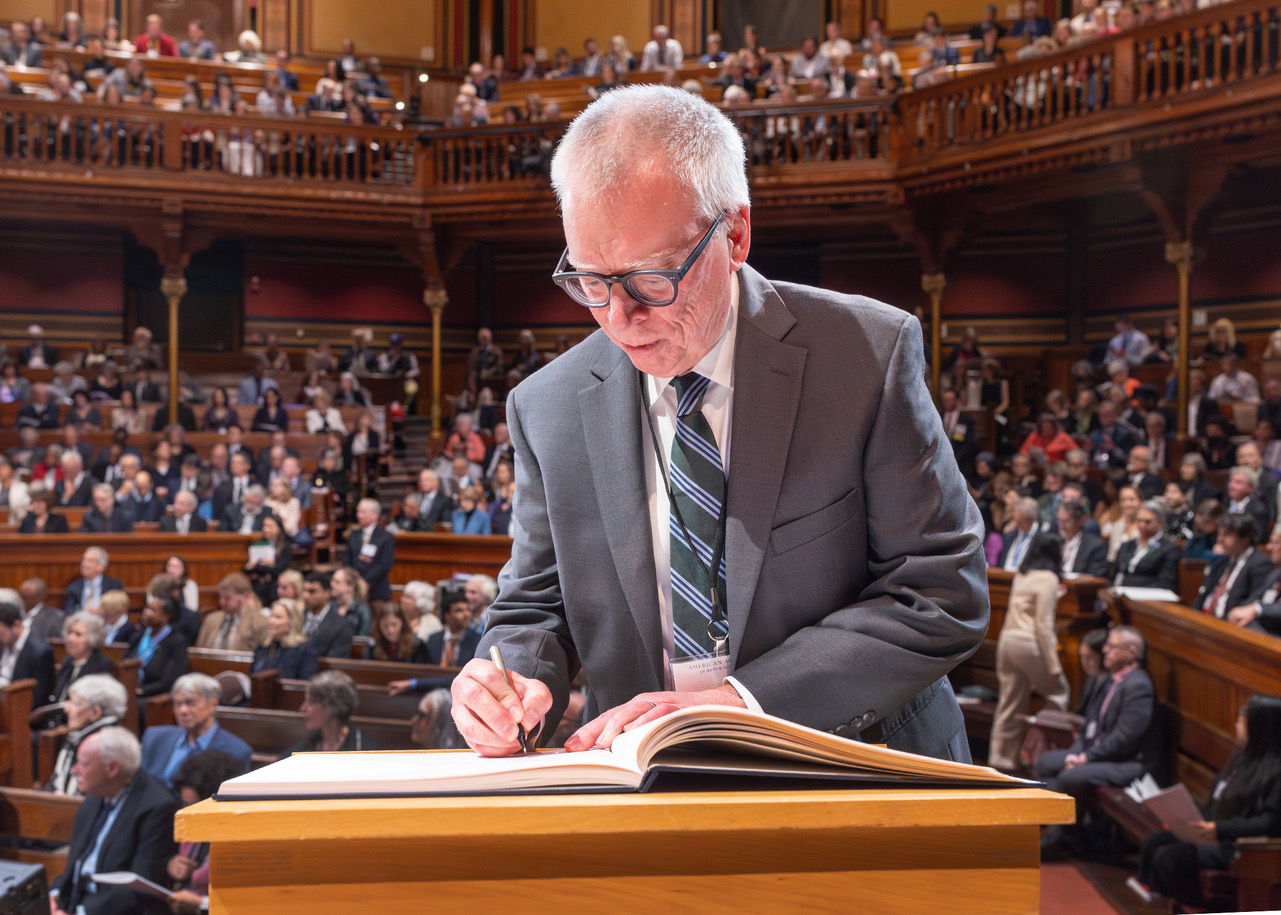 David Brakke signing American Academy of Arts and Sciences Induction Book