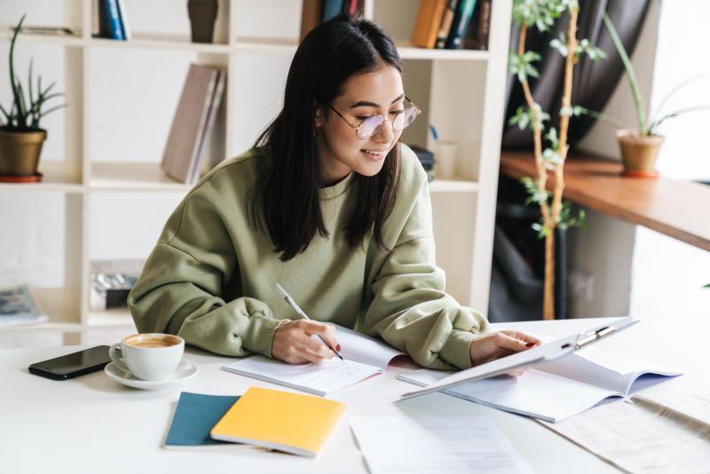 female student working on research