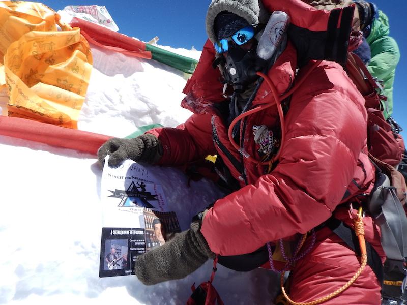 Mike holding tribute flag