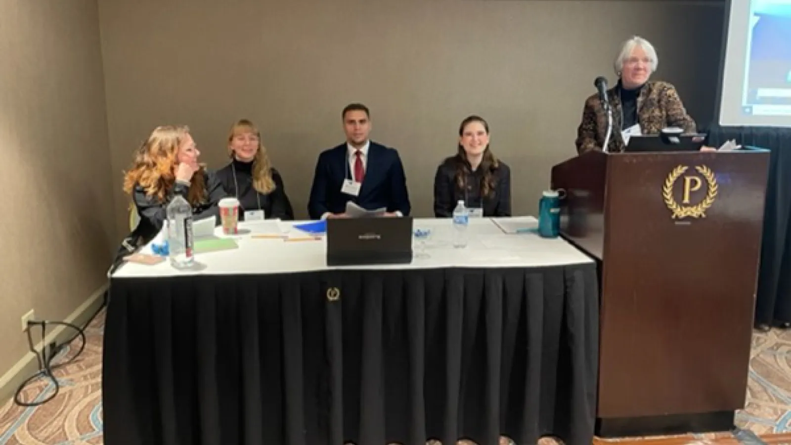 Sydney Heifler, Hannah Keller, John Rochford and Tori Paige with moderator Michelle Mouton