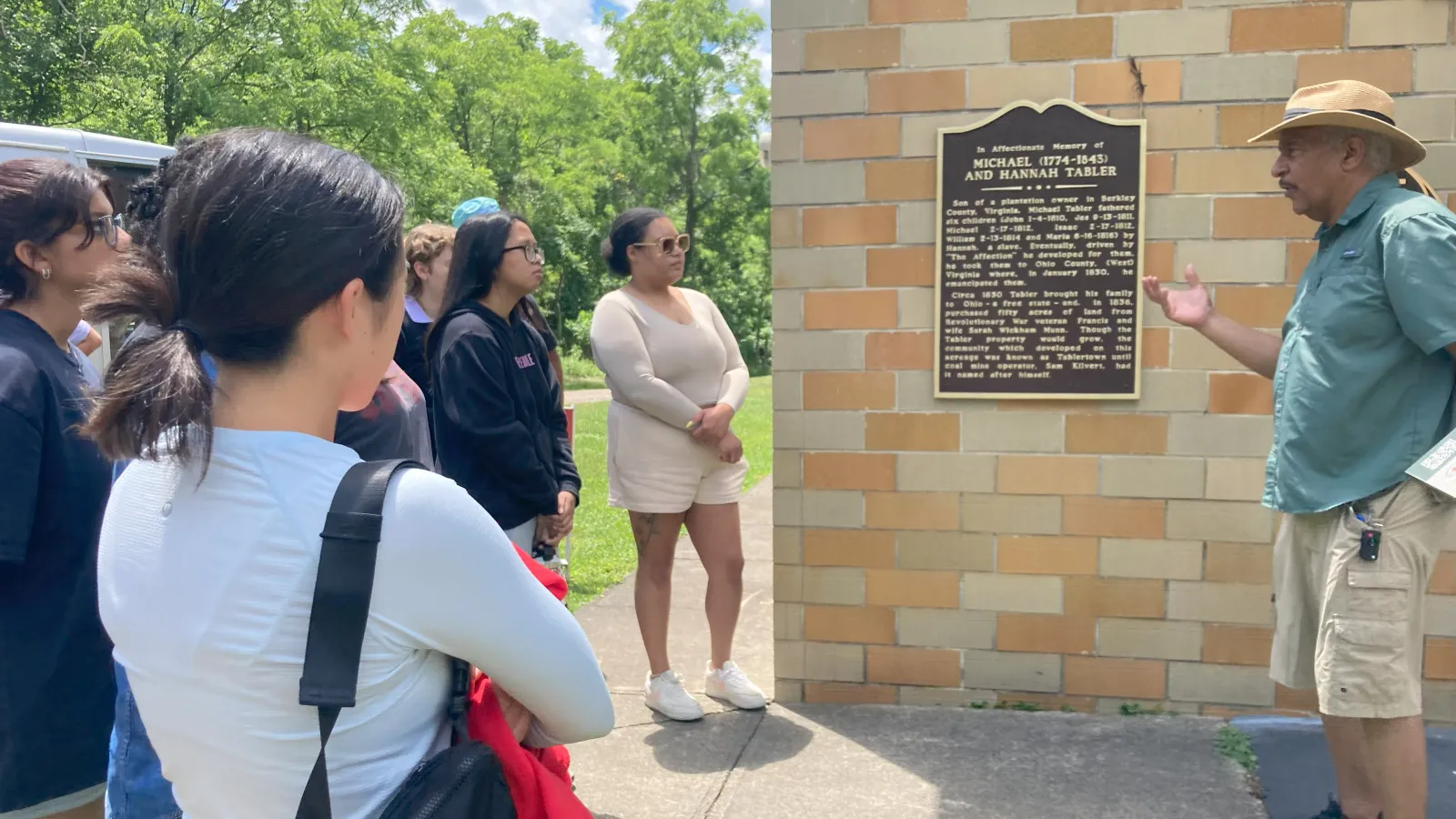 Students listen to David Butcher, a descendant of a formerly enslaved African American community in Ohio.