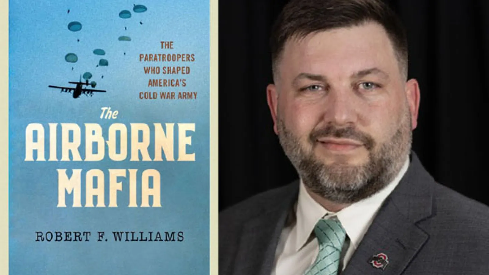 Rob Williams and his book cover with military airplanes in the air