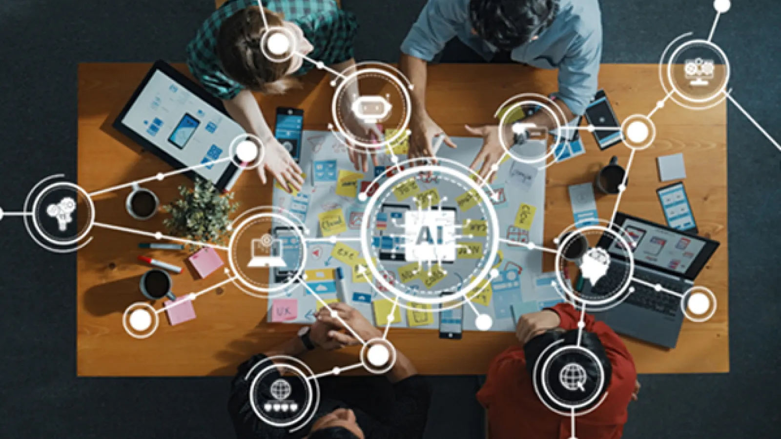 four people sitting at a table with electronic devices, AI chart is above them