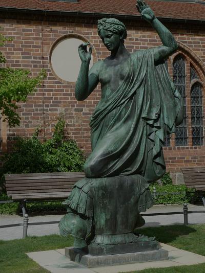 Statue of Clio by Albert Wolff in front of St. Nicholas Church in Berlin
