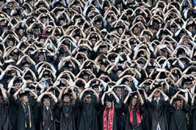 Ohio State students in caps and gowns at graduation ceremony