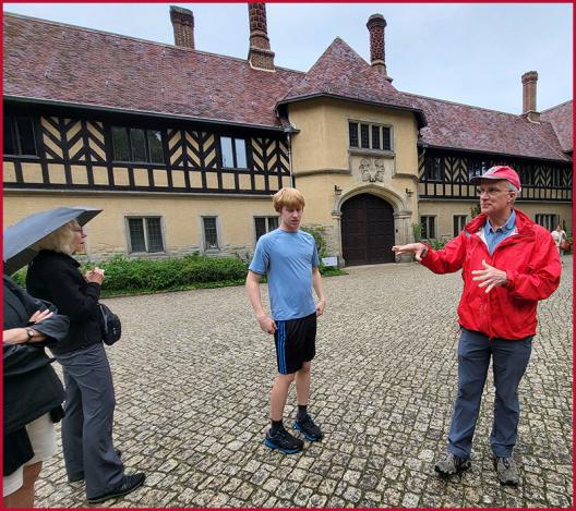 Faculty host, Peter Hahn, guiding group at Cecilienhof Palace in Potsdam, Germany.