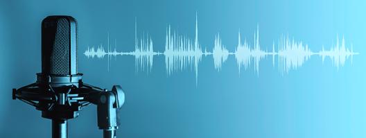microphone on a stand with waveforms to right of it