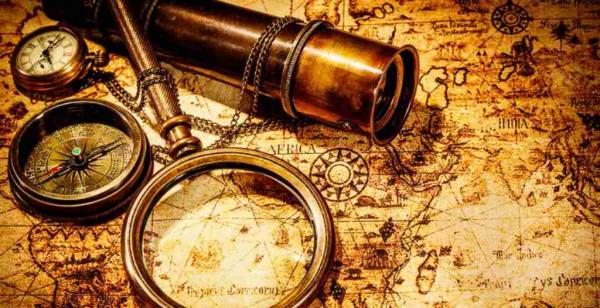 map, magnifying glass, compass, pocket watch and spy glass