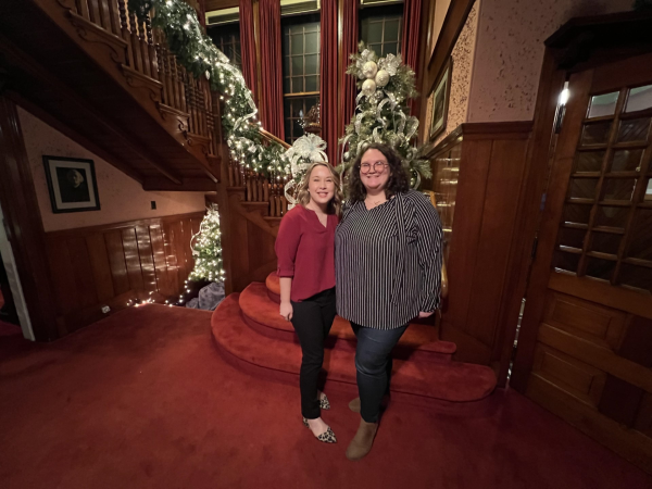 Tanesha Pickering on left and Keily Cunningham on right, standing in front of staircase