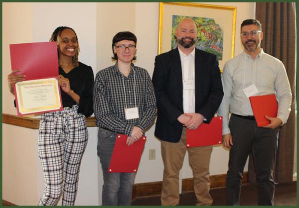 Recipients of the John H. Kauffman Family Graduate Award in American History, Sierra Phillips, Ives Hartman, and Ben St. Angelo with Clayton Howard.