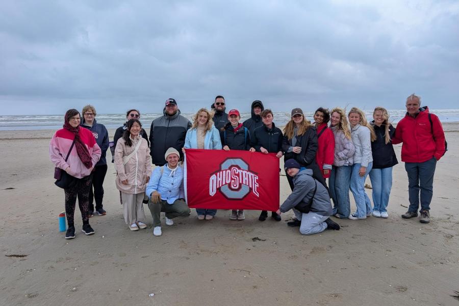 Peter Hahn and Ohio State students on Omaha Beach