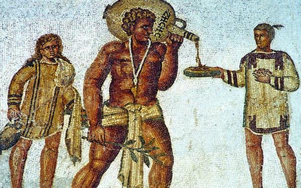 a slave in ancient times pouring liquid onto a bowl held another person