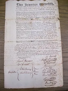 Photograph of a historical document with printed and hand written sections