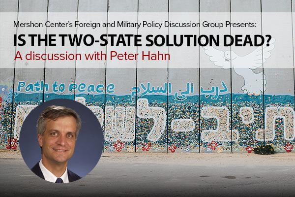 Peter Hahn with mural in background
