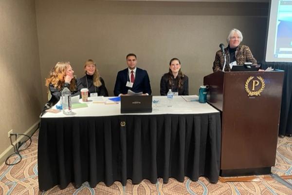 Sydney Heifler, Hannah Keller, John Rochford and Tori Paige with moderator Michelle Mouton