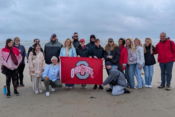 Peter Hahn and students on the 2025 WWII tour on Omaha Beach