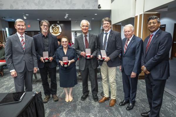 Peter Hahn and colleagues at Board of Trustees Meeting