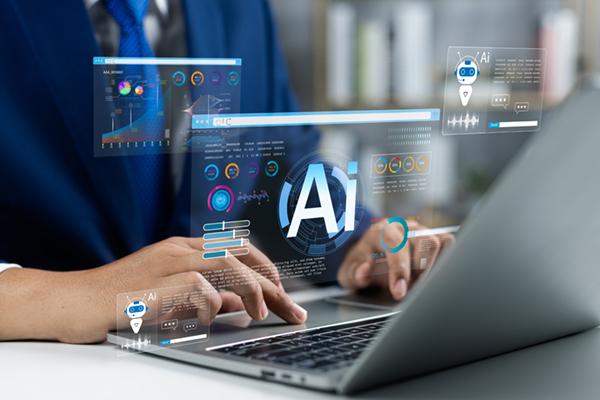 a person's hands on a laptop keyboard with the letters A and I in the air above it
