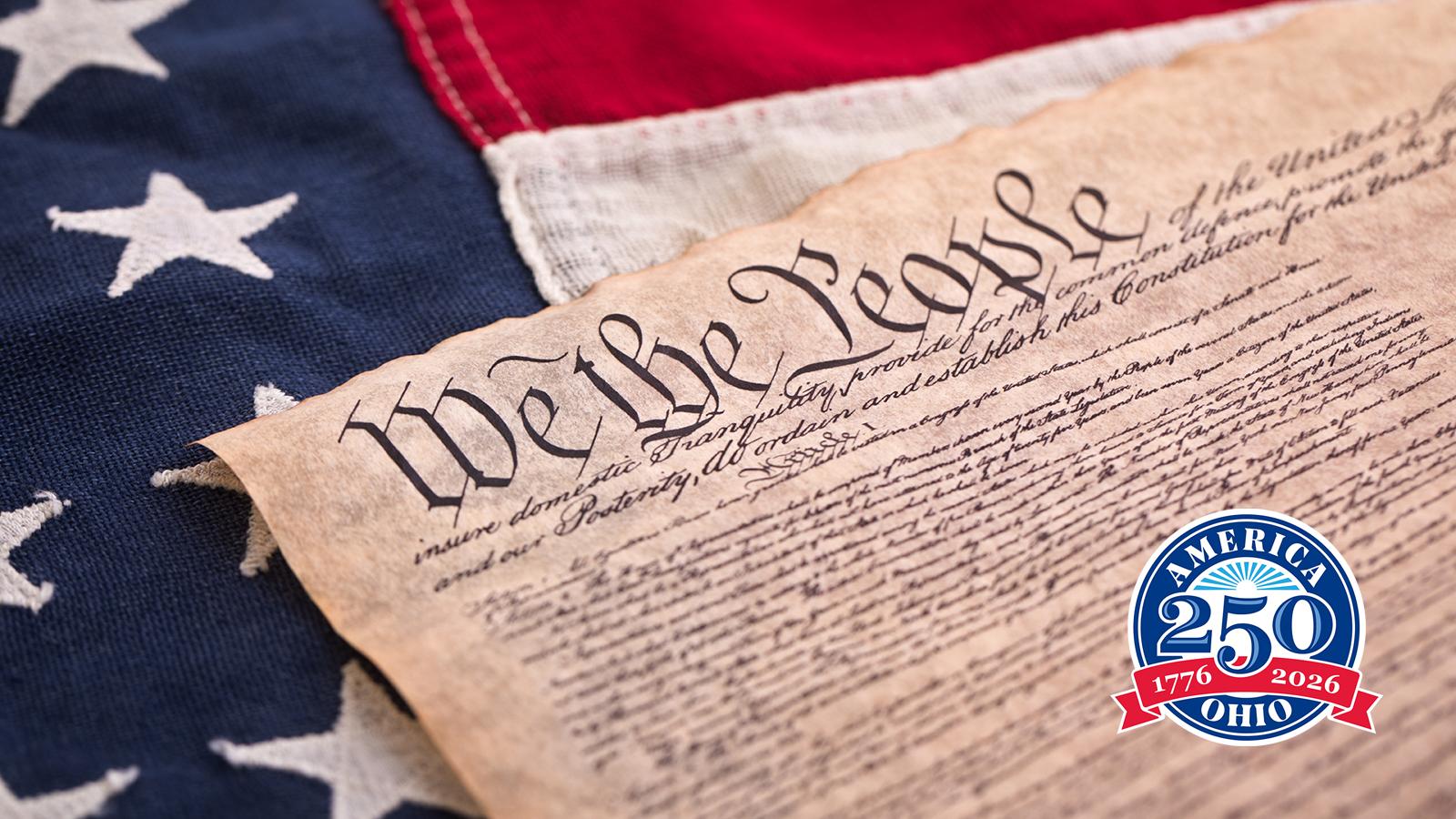 The Constitution laying on the American flag