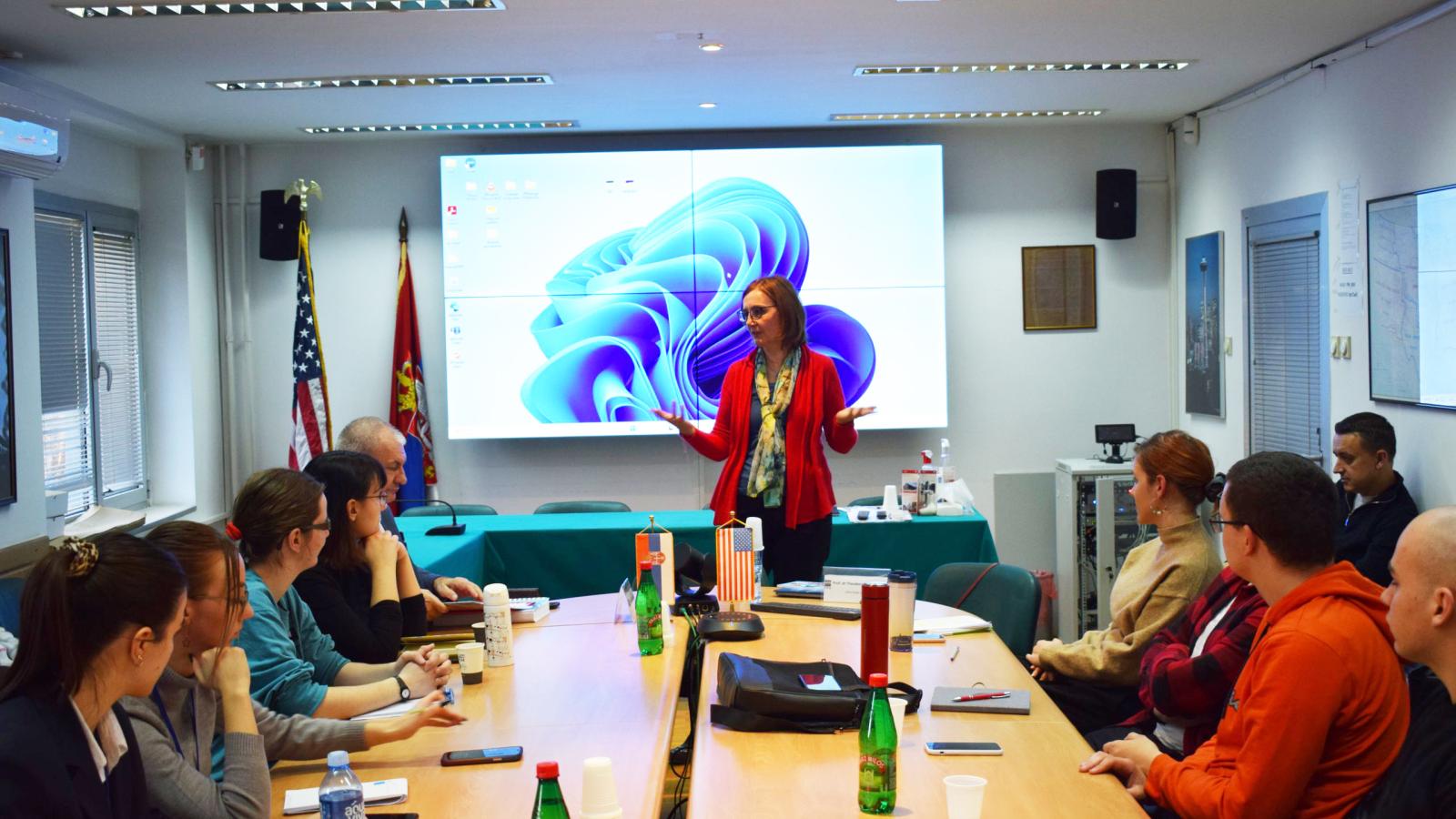 Prof. Dragostinova speaking to students