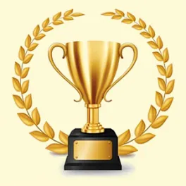 gold trophy with gold leaves around it